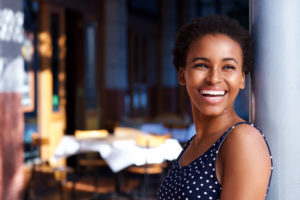A woman smiling